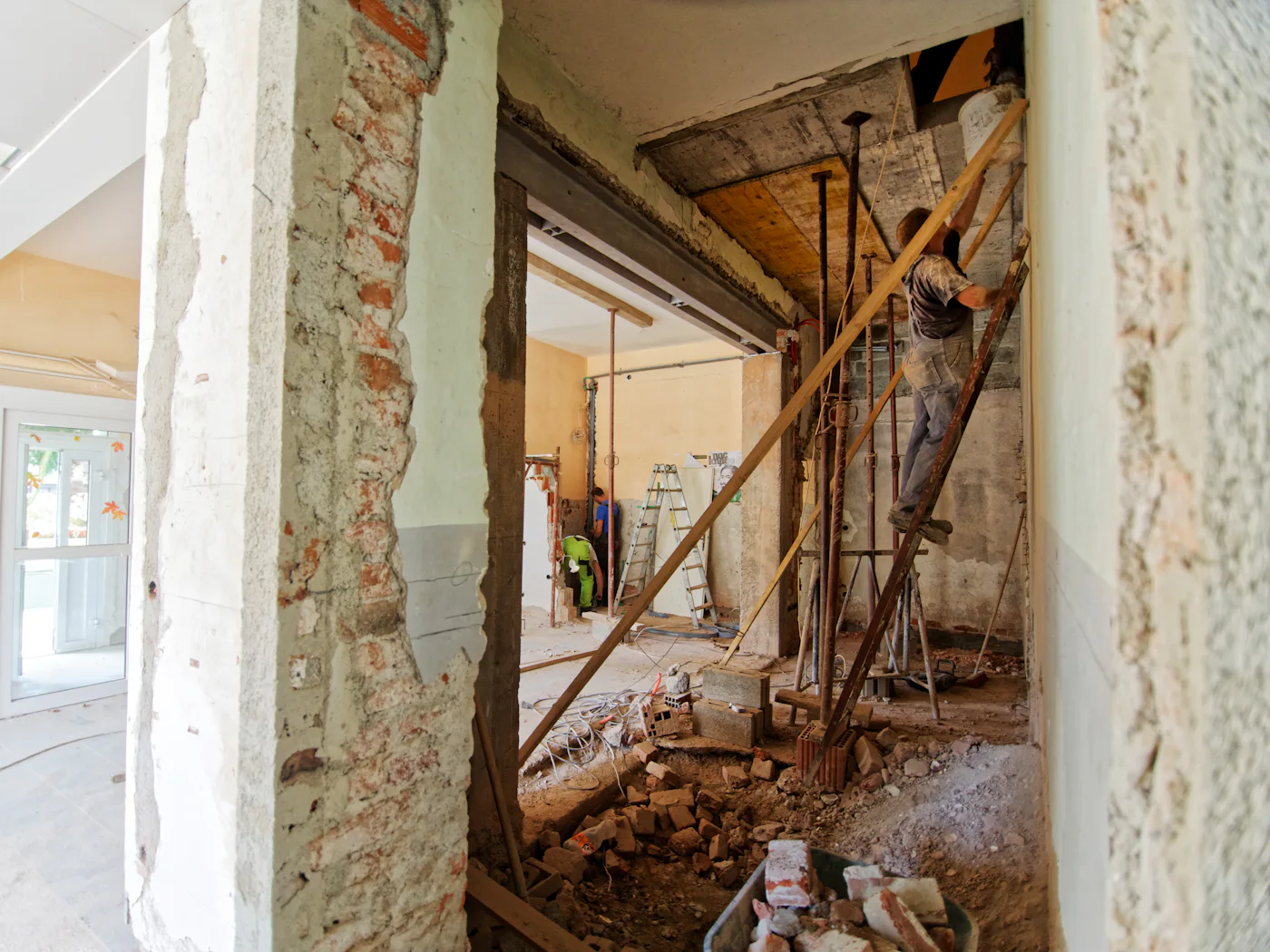 A bathroom stripped back to brick and joists on the first day